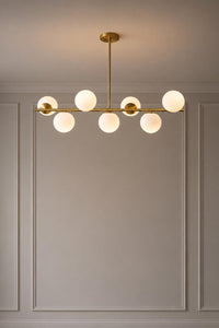 Modern Brass Globe Chandelier, Mid Century Modern Linear Pendant Light, 7 Light Milk Glass Ceiling Fixture for Dining Room